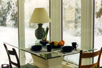 table set for breakfast in window corner